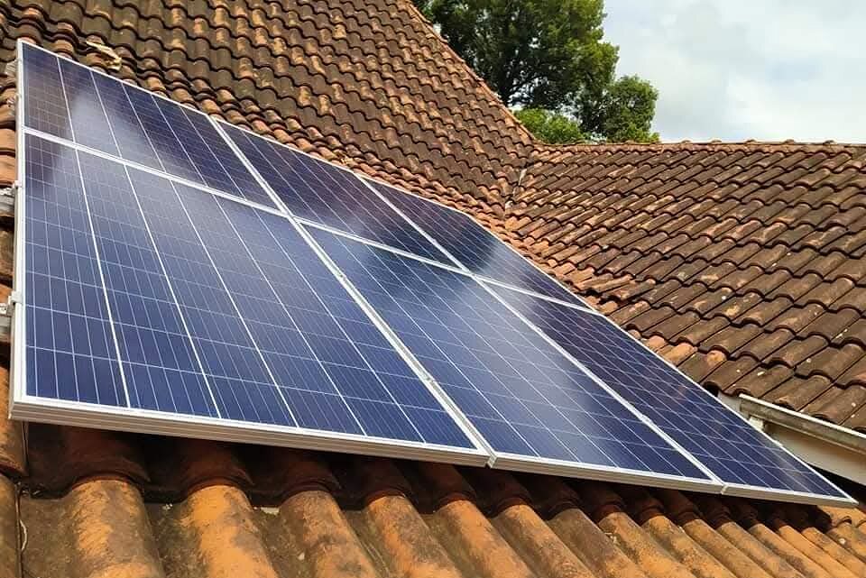 Residential rooftop solar panels on a tiled roof in Durban
