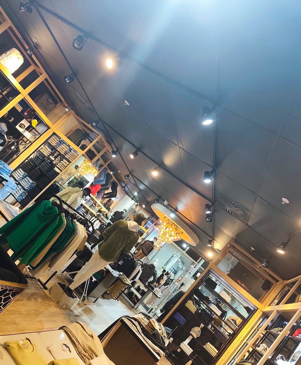 Retail clothing store with track and feature lighting installed in Durban