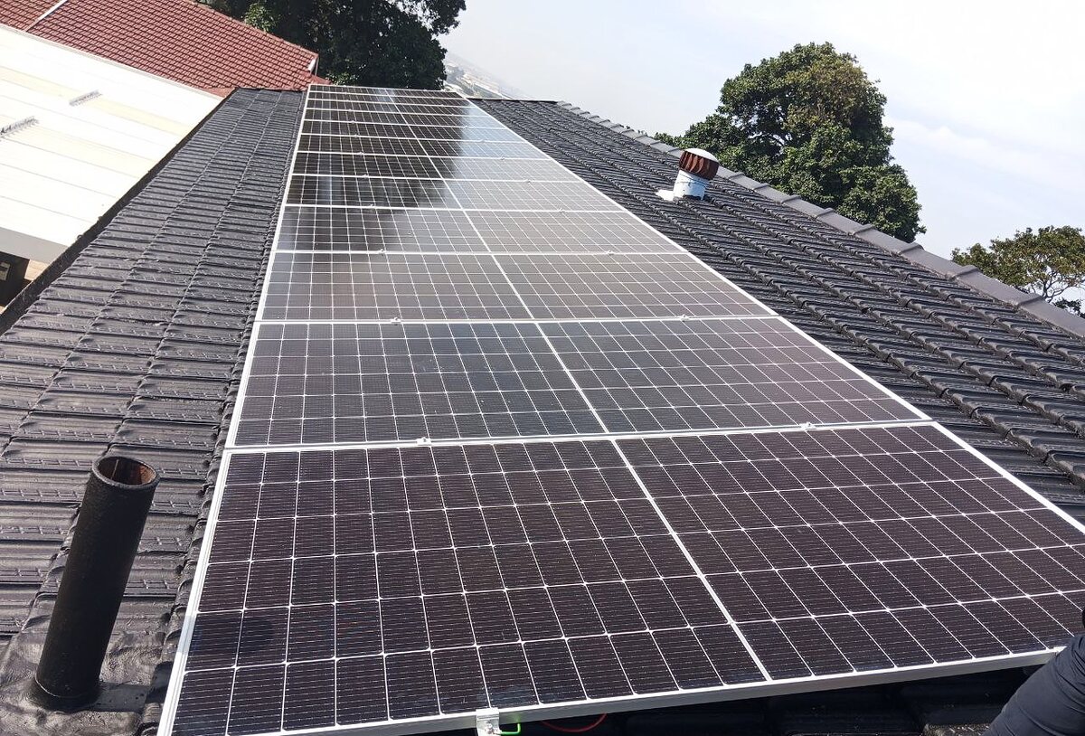 Rooftop solar panel installation on a tiled roof in Durban